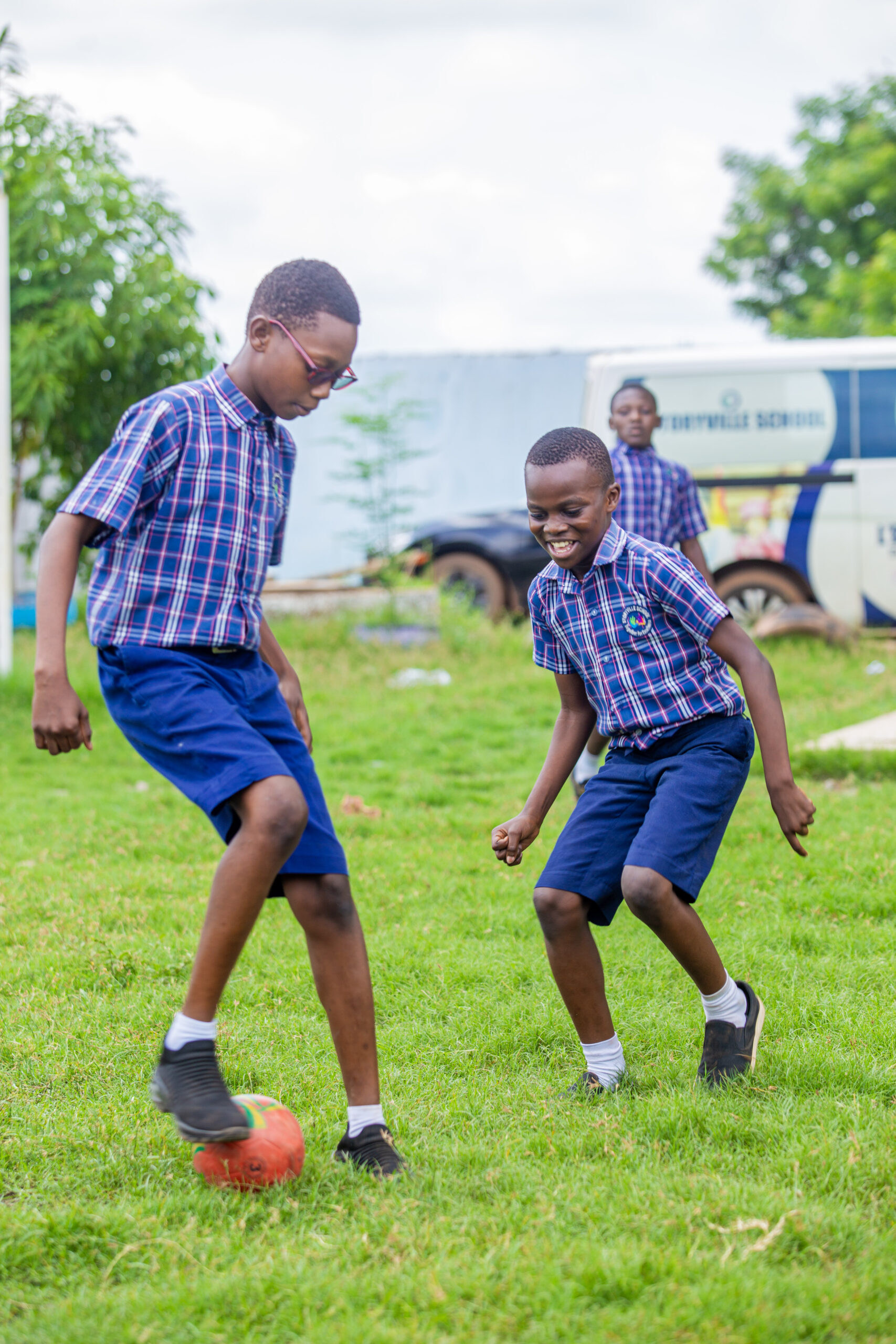 Primary students outdoor sport Storyville Tamale