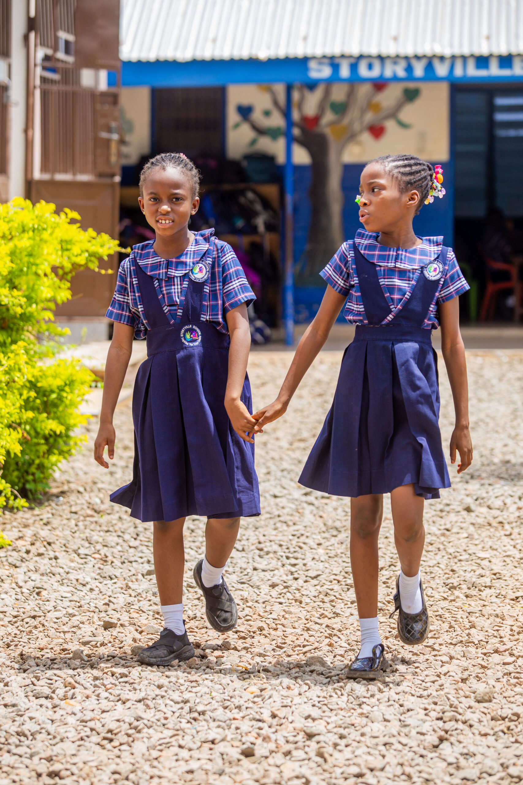Two Primary girls Storyville Tamale